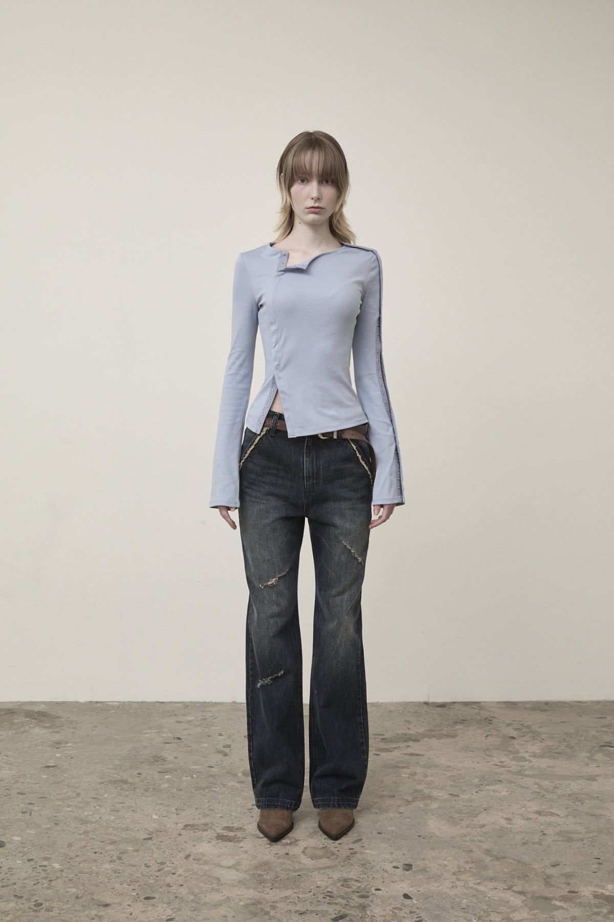 matinkim SEMI BOOTS CUT WASHED DENIM PANTS IN NAVY