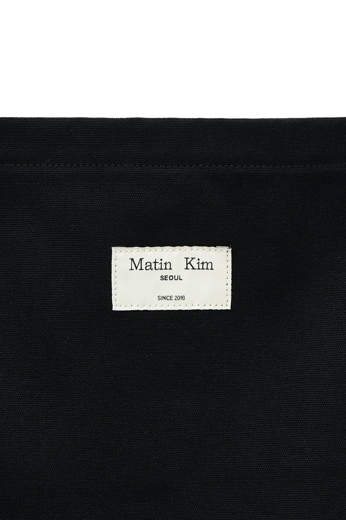matinkim EYELET LOGO CANVAS ECOBAG IN BLACK