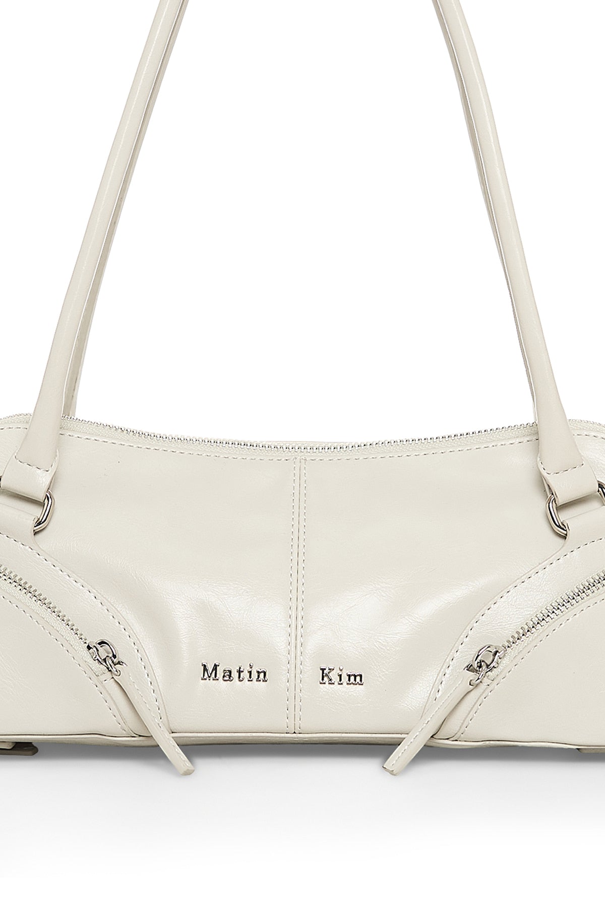 matinkim CURVE ZIP BAGUETTE BAG IN LIGHT GREY