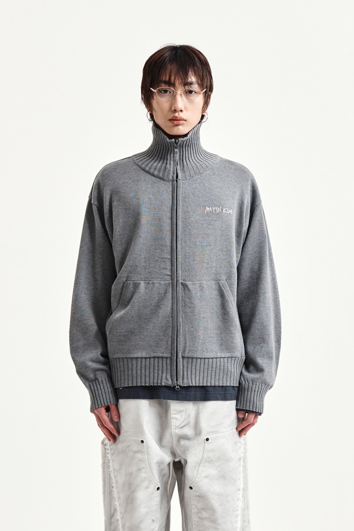 matinkim HIGH NECK EMBROIDERED LOGO ZIP UP FOR MEN IN GREY