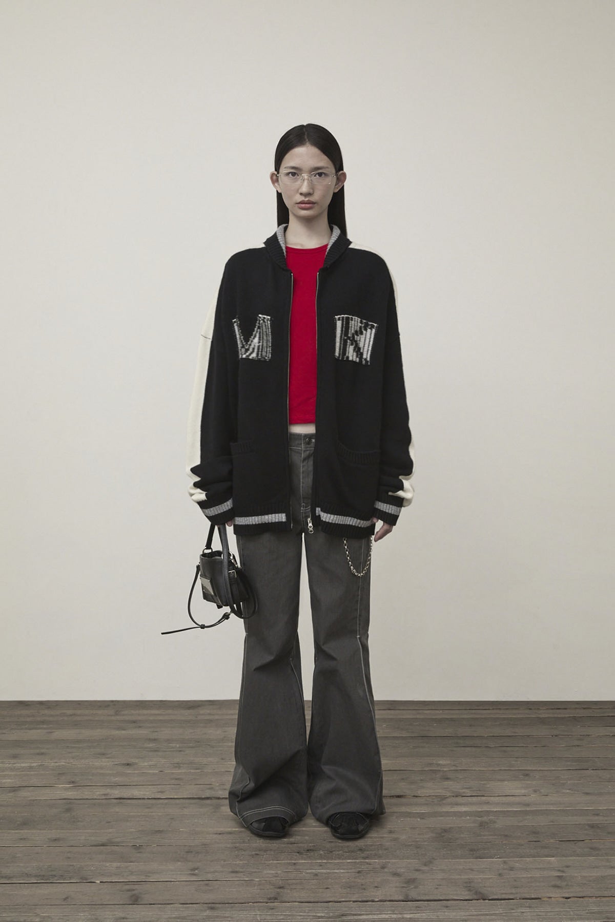 matinkim MATIN KIM INITIAL KNIT ZIP UP FOR WOMEN IN BLACK
