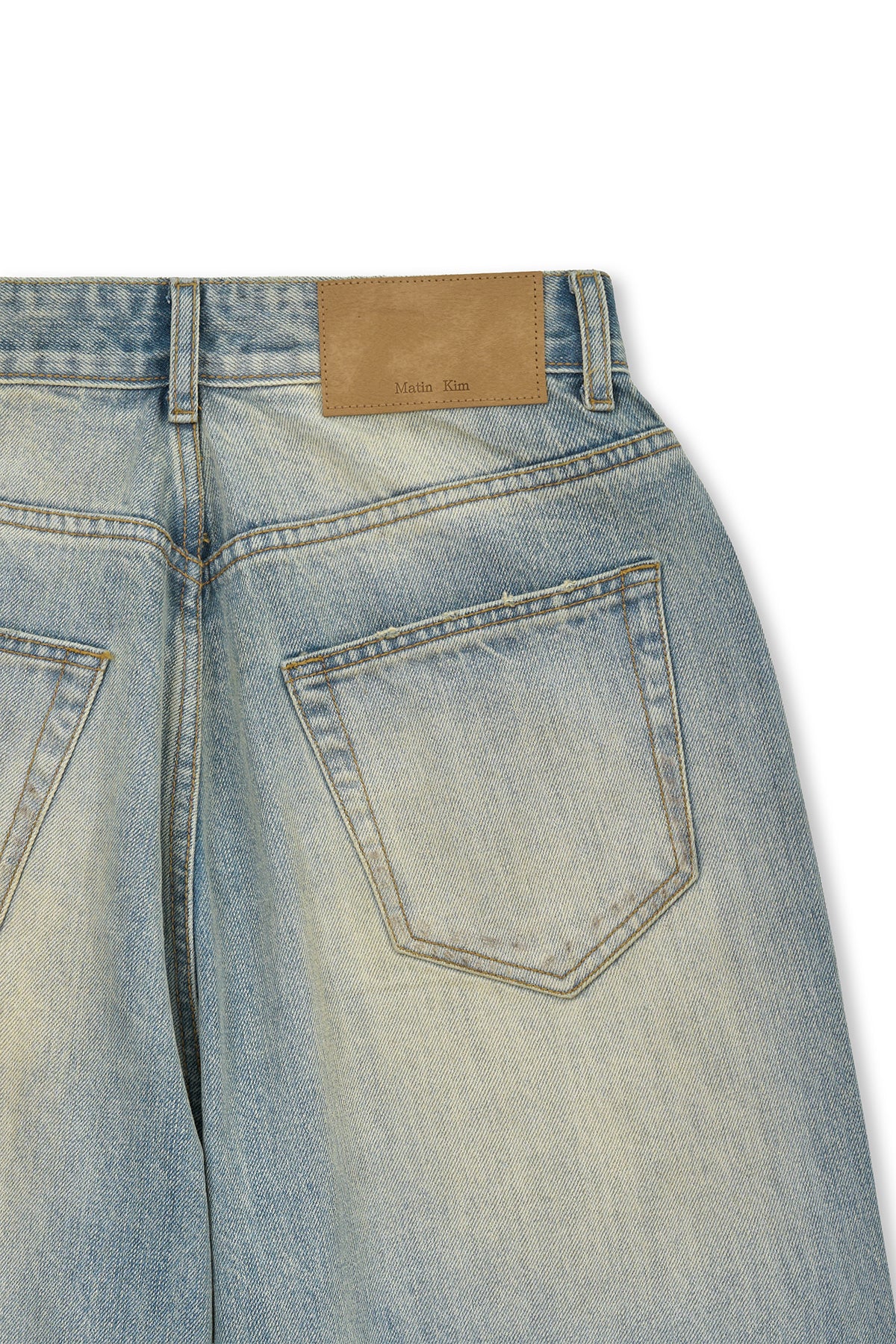 matinkim VINTAGE DIRTY WASHED DENIM PANTS IN LIGHT BLUE