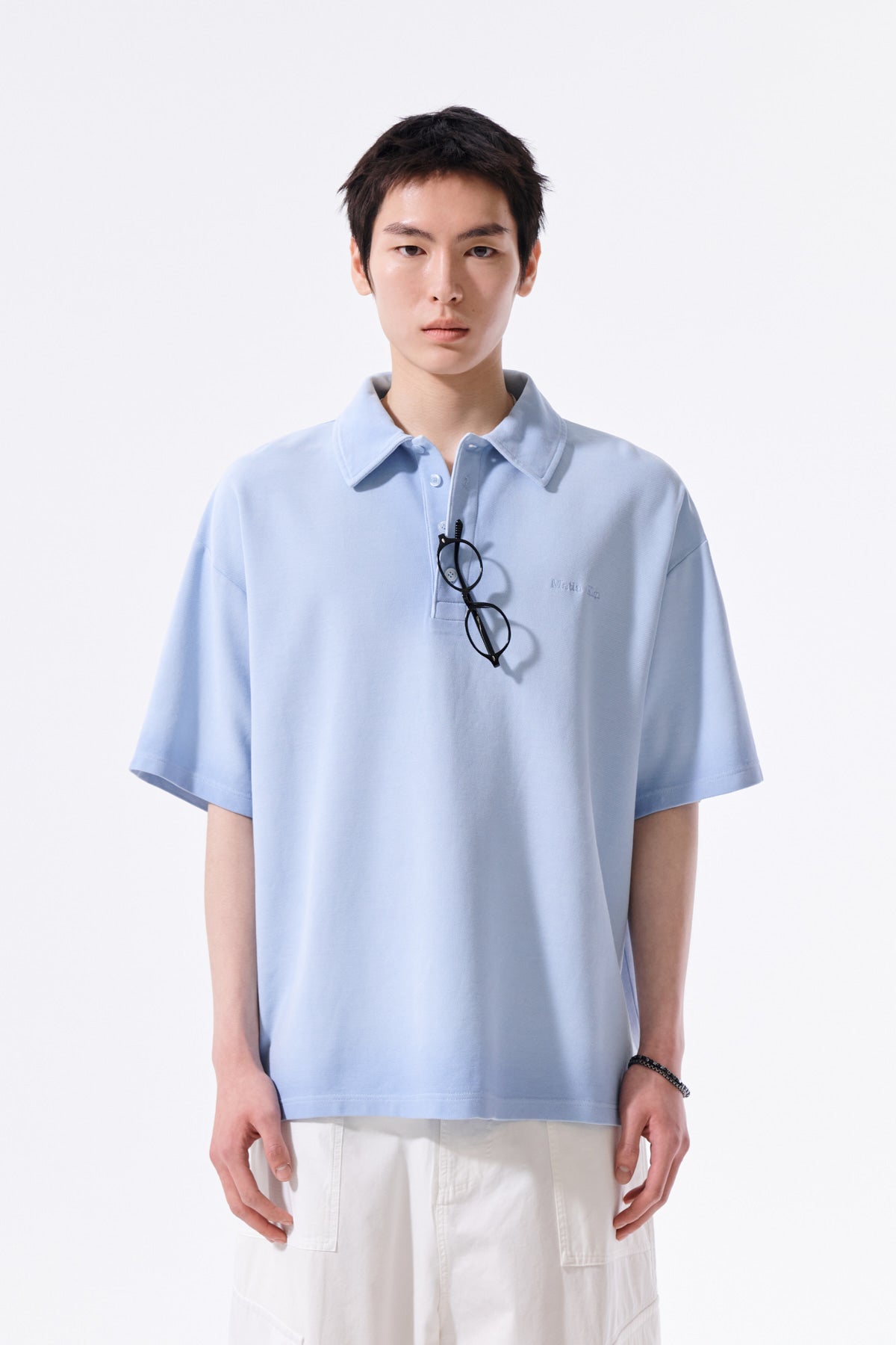 matinkim SMALL LOGO WASHED PIQUE TOP FOR MEN IN BLUE