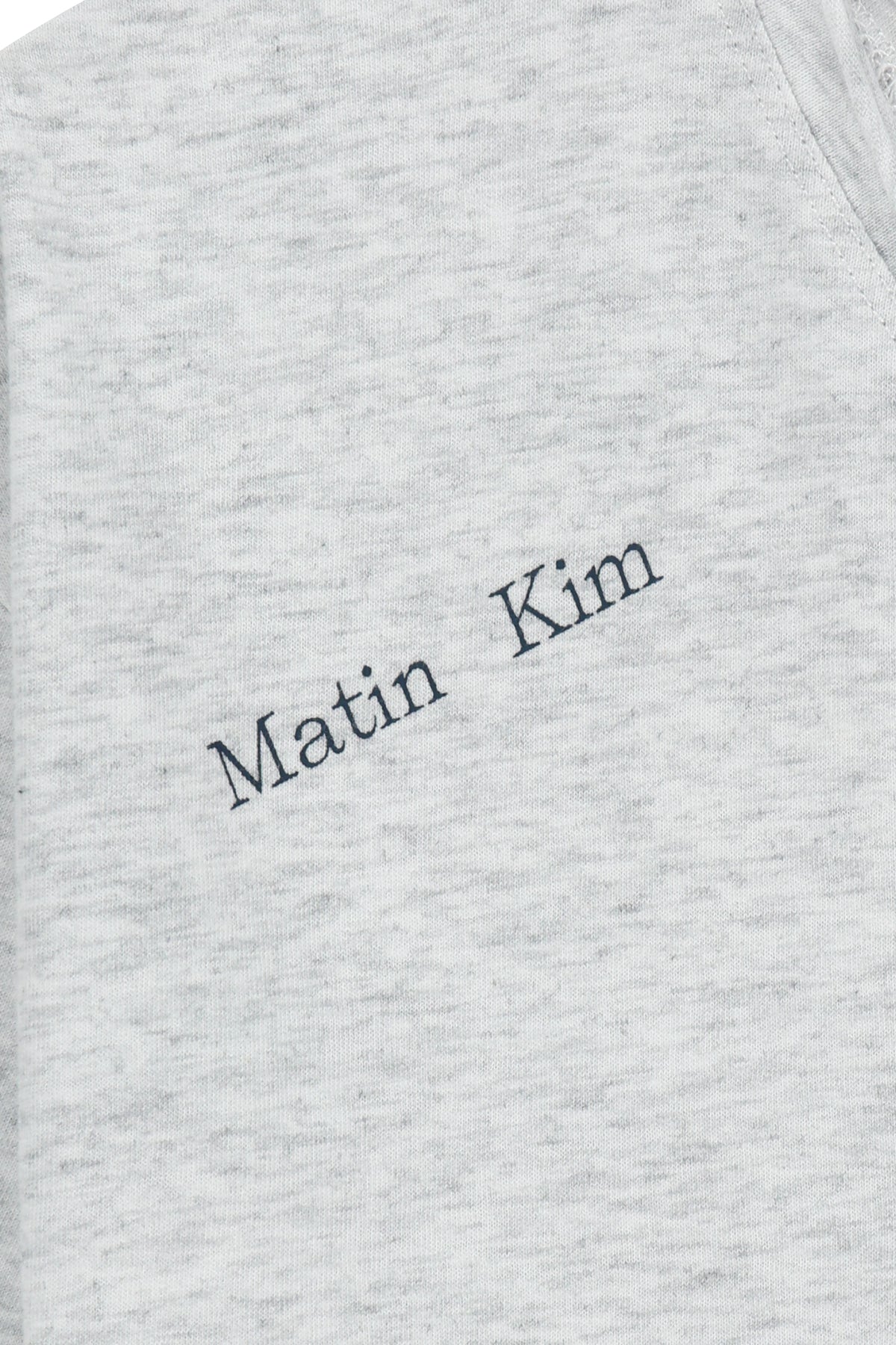 matinkim ASYMMETRIC OFF SHOULDER TOP IN LIGHT GREY