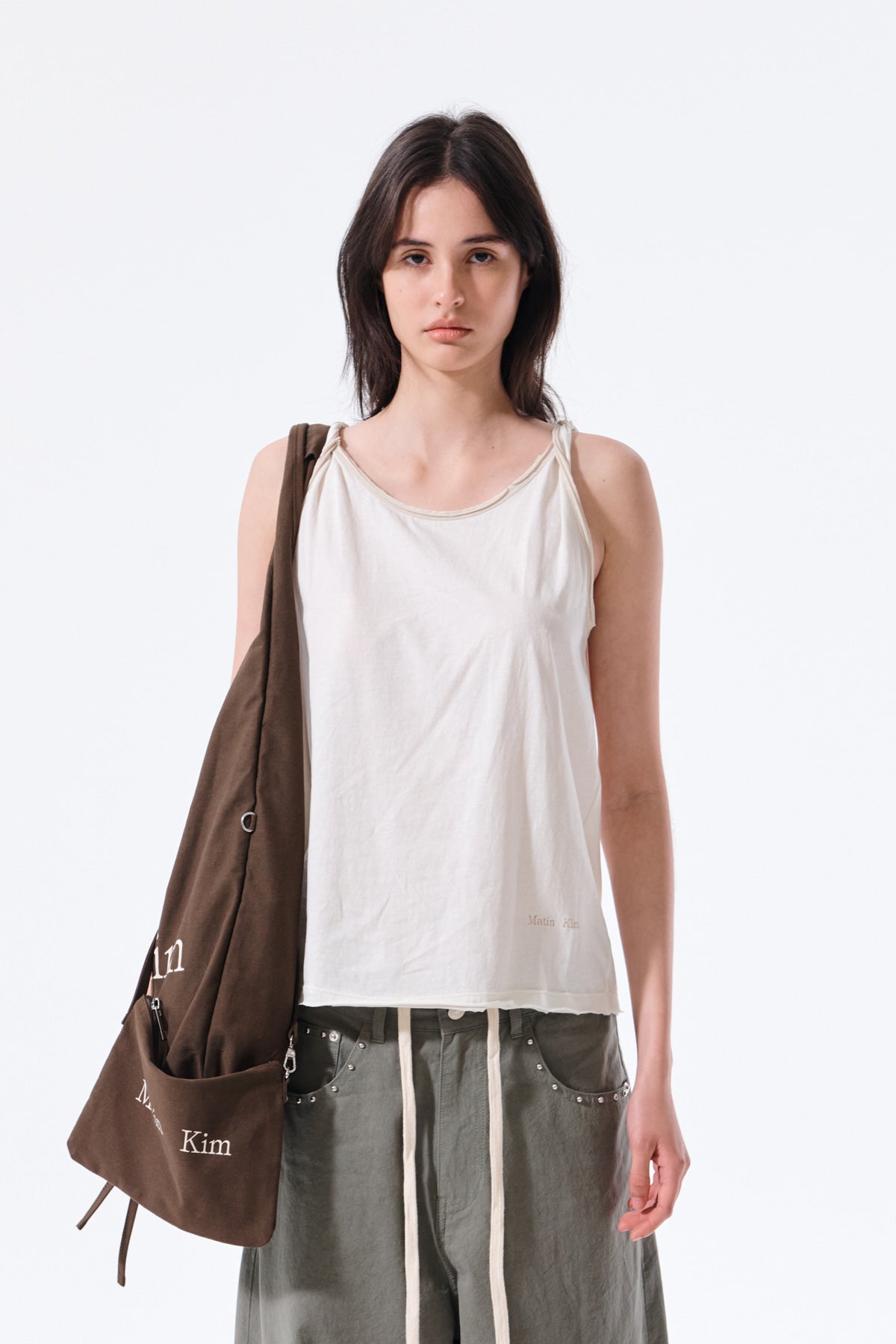 matinkim TWIST SHOULDER SLEEVELESS TOP IN CREAM