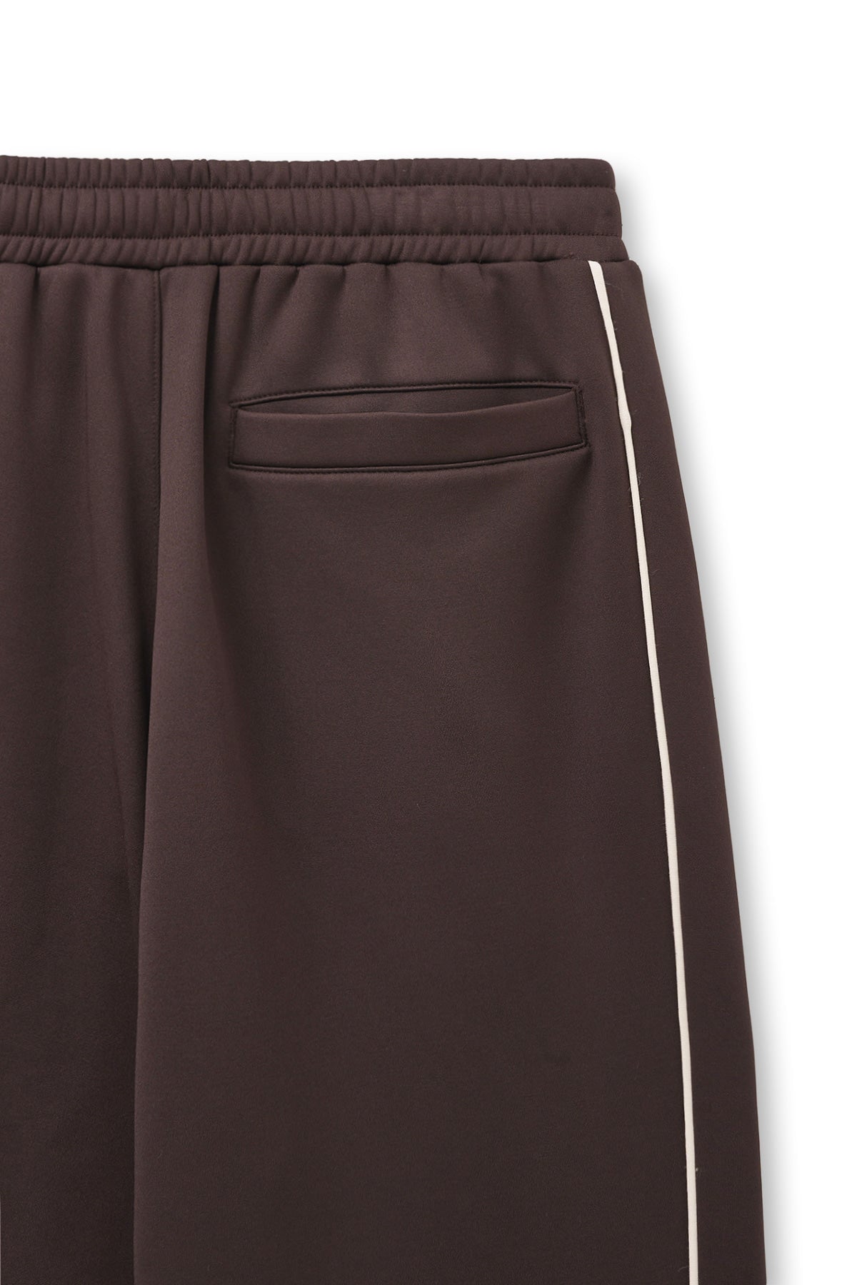 matinkim HEART LOGO TRACK PANTS IN BROWN