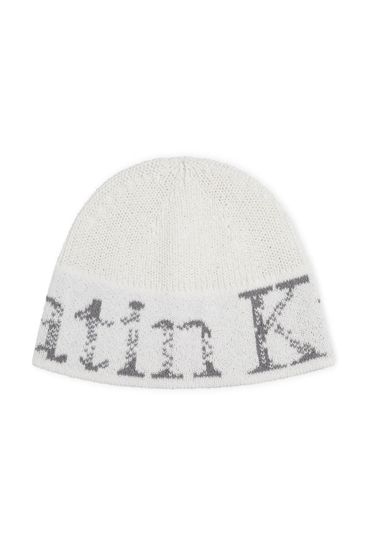 matinkim CRACKED LOGO LIGHT BUCKET BEANIE IN IVORY