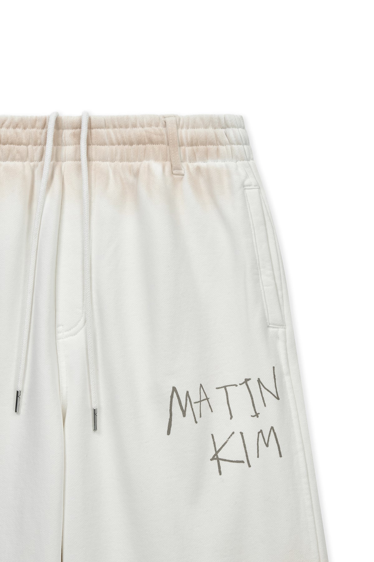 matinkim VINTAGE WASHED LOGO SWEATPANTS IN IVORY
