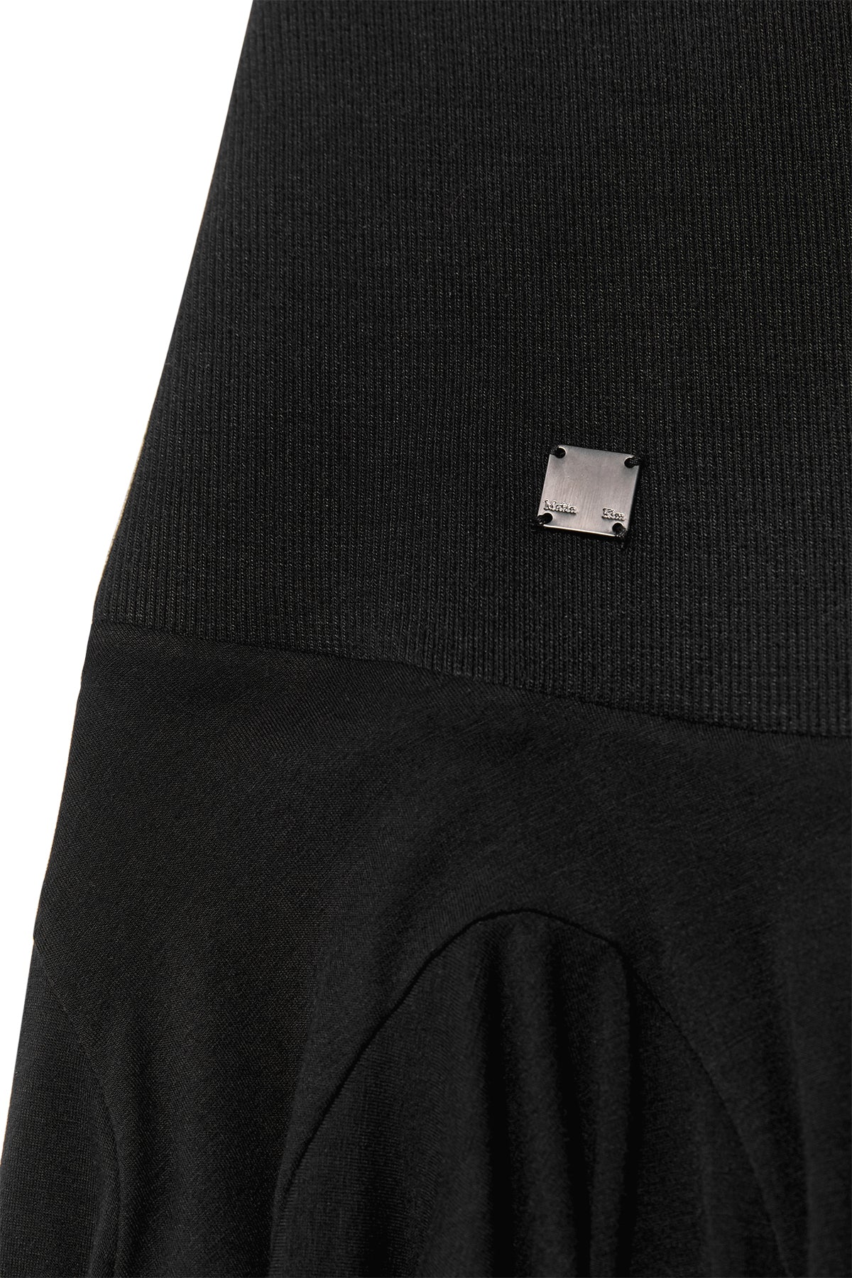 matinkim UNBALANCE FLARE FOLDING SKIRT IN BLACK