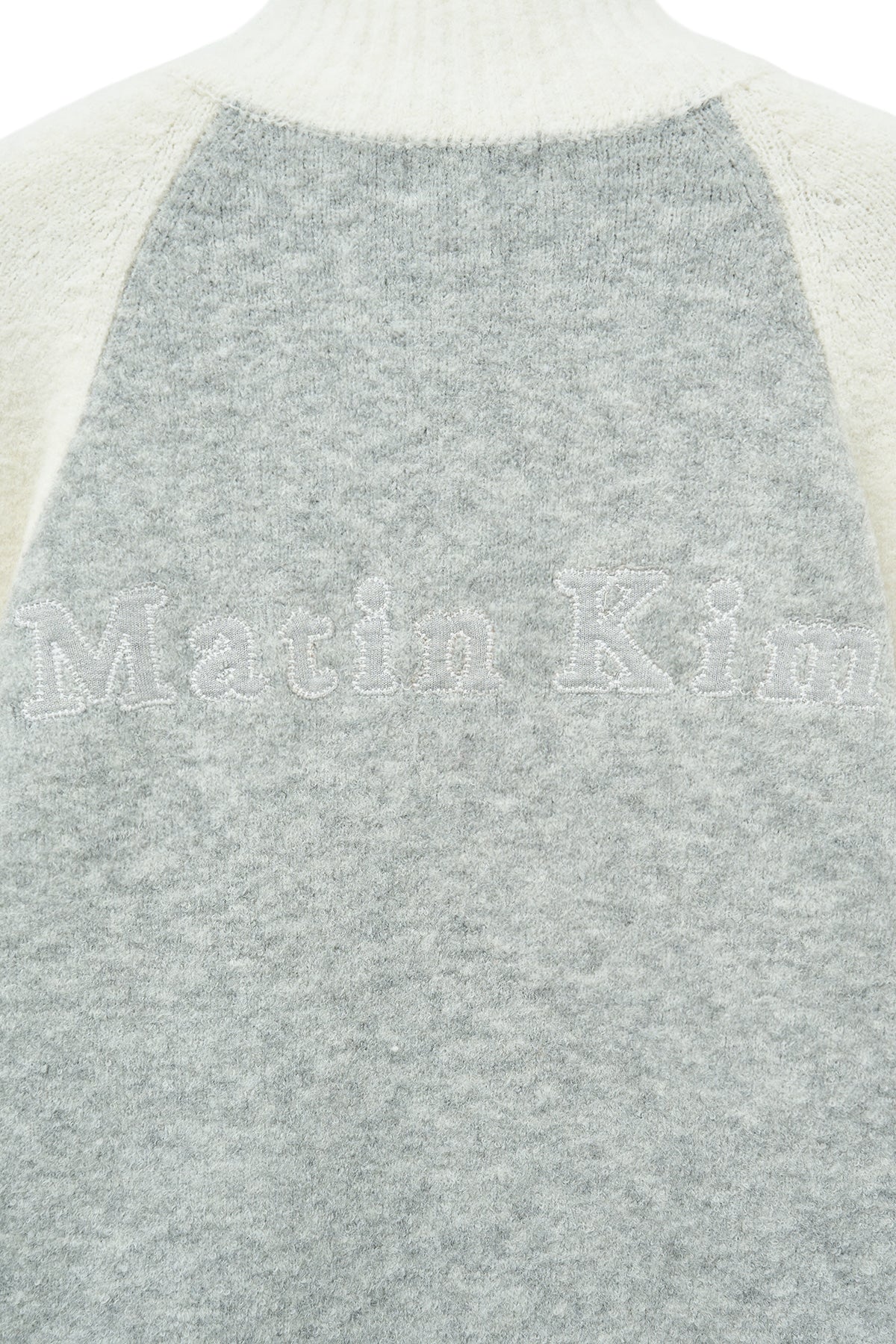 matinkim HIGH NECK RAGLAN KNIT ZIP UP FOR WOMEN IN IVORY