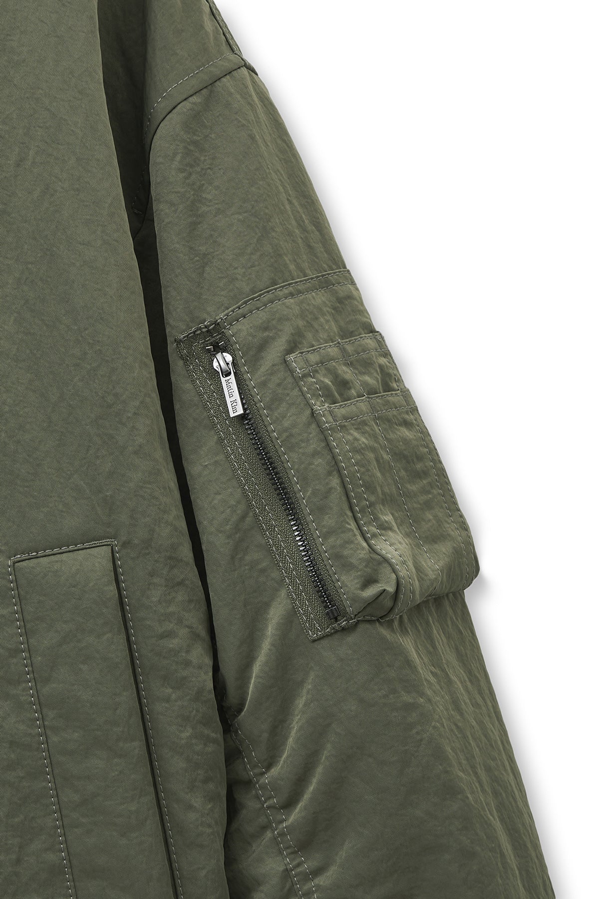 matinkim HIGH NECK BUTTON POINT ZIP UP JUMPER IN KHAKI